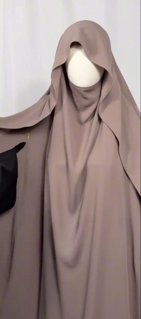 Un Jilbab Raffine Au style Unique.